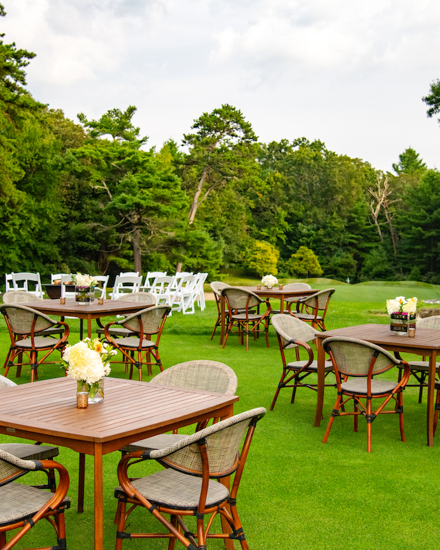 Picturesque waterfall garden picnic setup at The Preserve Resort & Spa, Rhode Island for outdoor events.