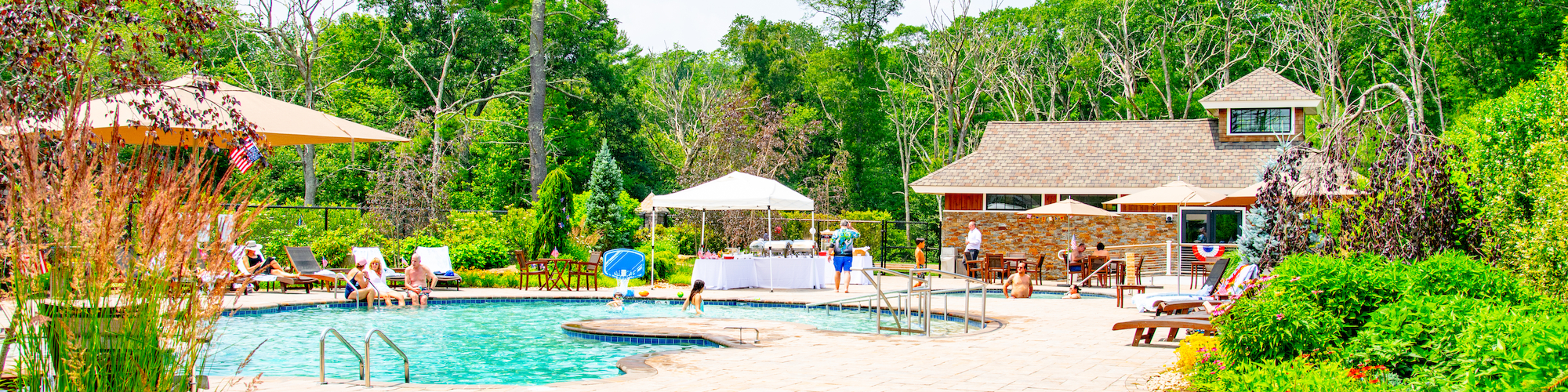 Families and friends enjoy the vibrant Pool Patio at The Preserve Resort & Spa, a luxurious event venue for summer gatherings.