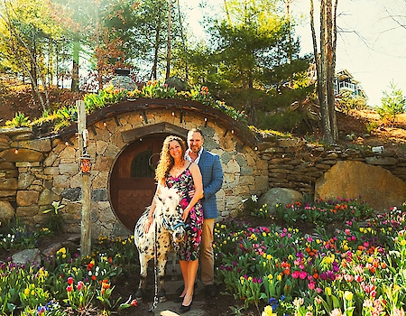 Couple and pony at Hobbit House amid vibrant spring blooms at The Preserve.