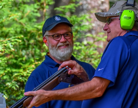 Two men enjoying clay shooting at The Preserve Resort & Spa, RI